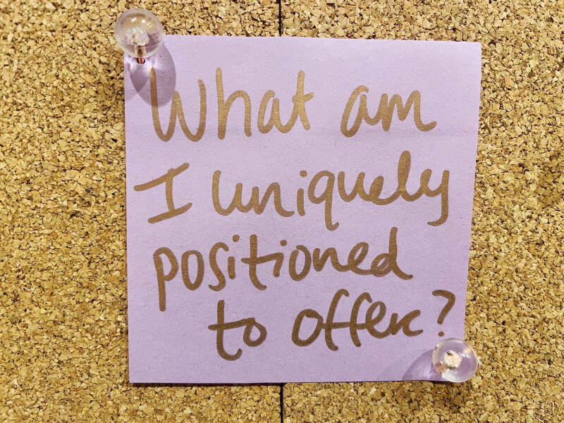 Sticky note photo at Natalie's desk